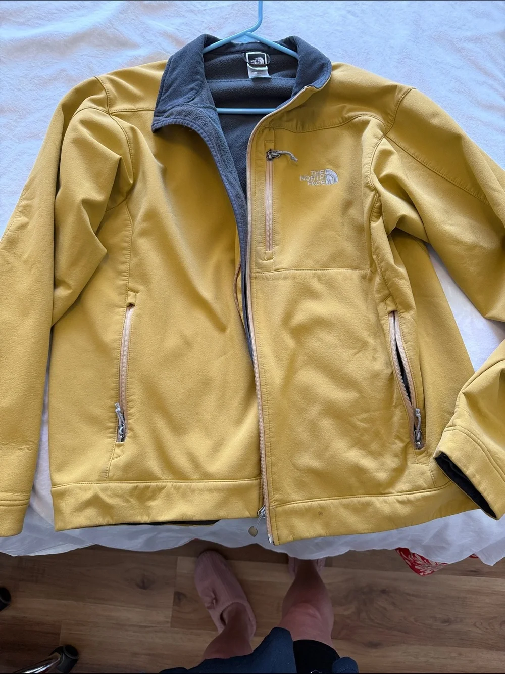 The North Face Yellow Softshell Jacket with Gray Lining